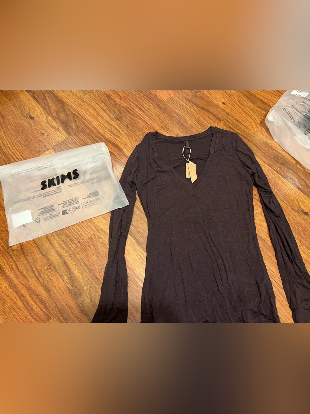 NWT SKIMS Sheer Modal long sleeve v neck color phoenix (brown) size small